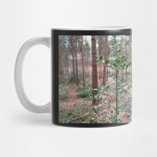 Holly Leaf tree with big trees in the background Mug